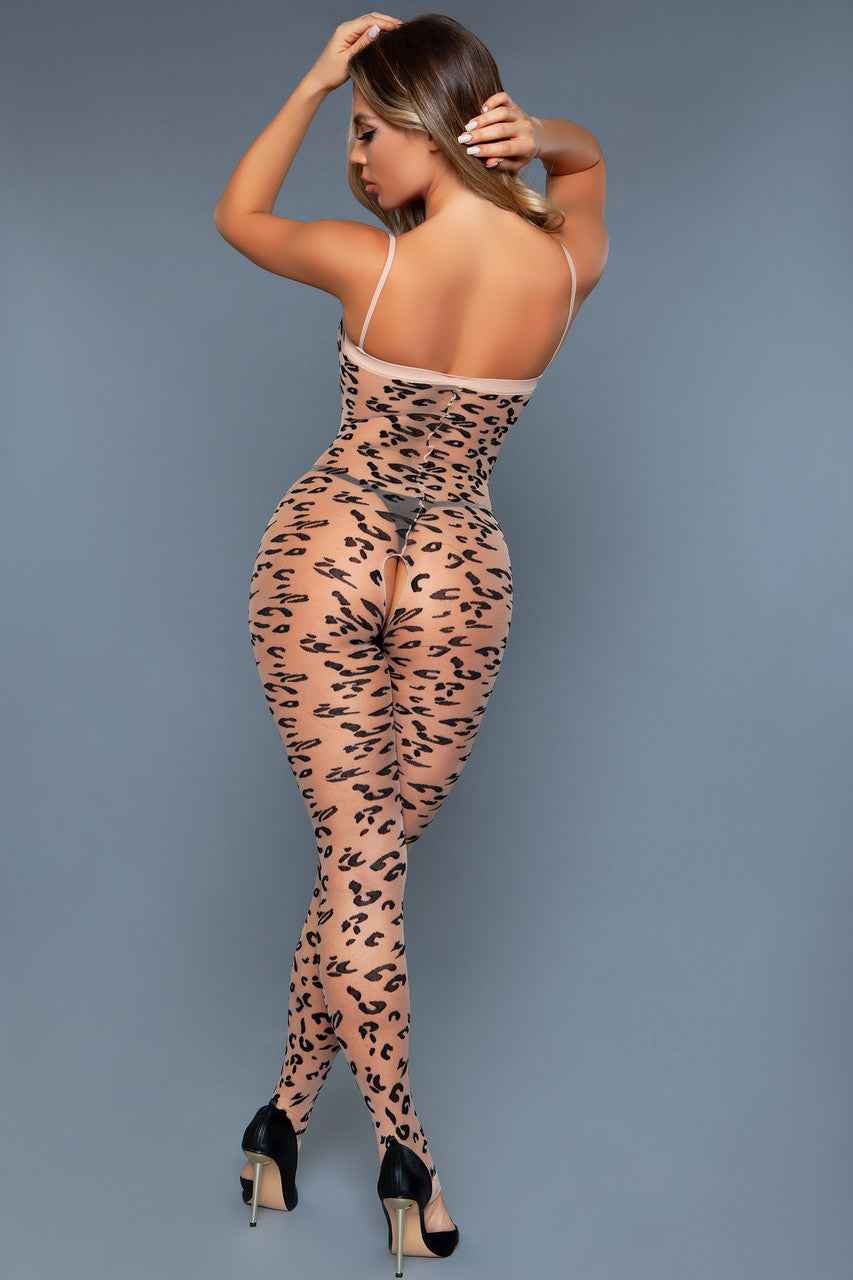 Woman wearing bold leopard lingerie outfit hosiery with sheer leopard print and spaghetti straps
